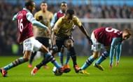 Bradford City's Zavon Hines (C) and Aston Villa's Fabian Delph (L) and Barry Bannan at Villa Park on January 22, 2013